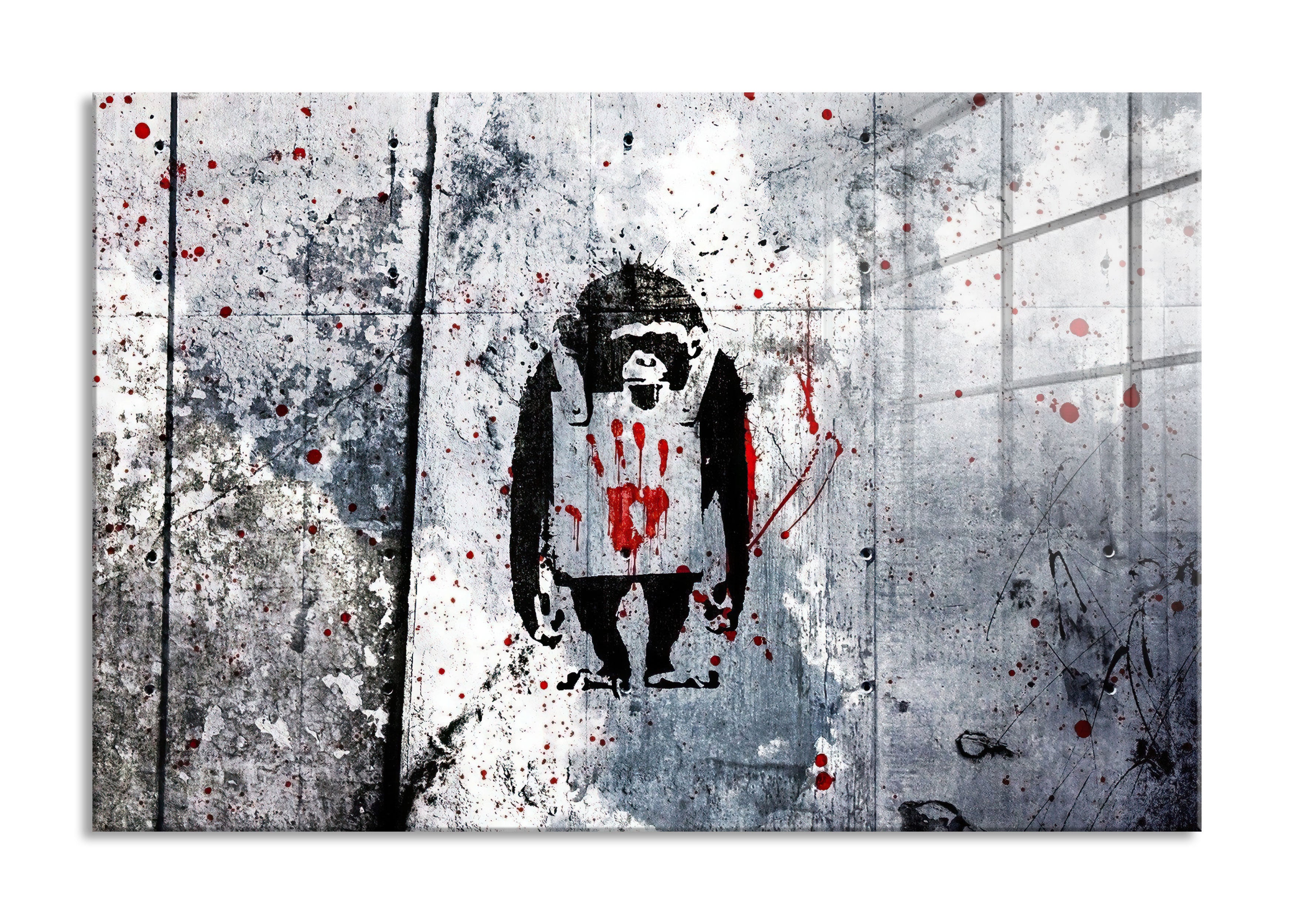 Banksy - Affe mit Hand abdruck , Glasbild