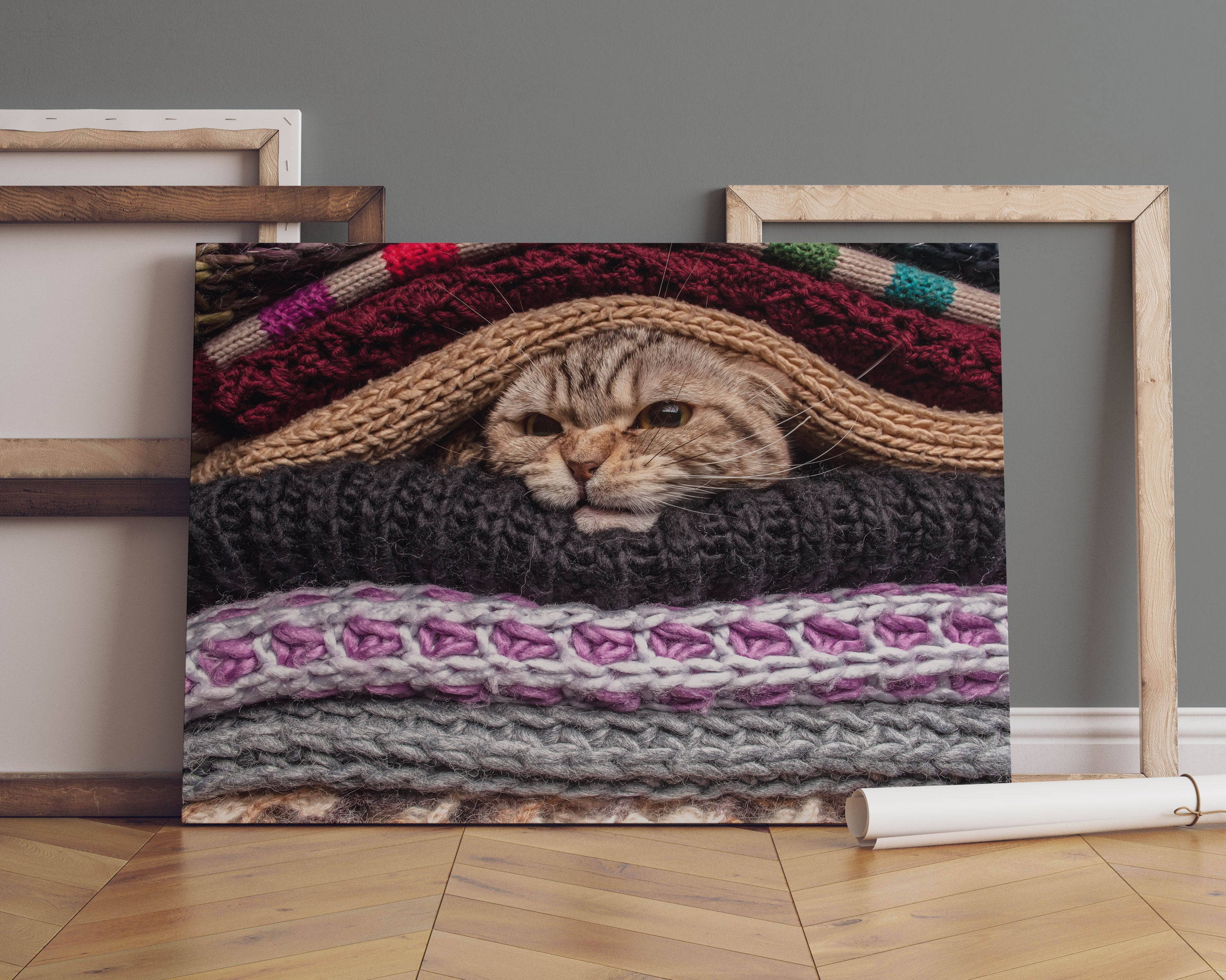 Katzen zwischen Pullovern Leinwandbild Sofa