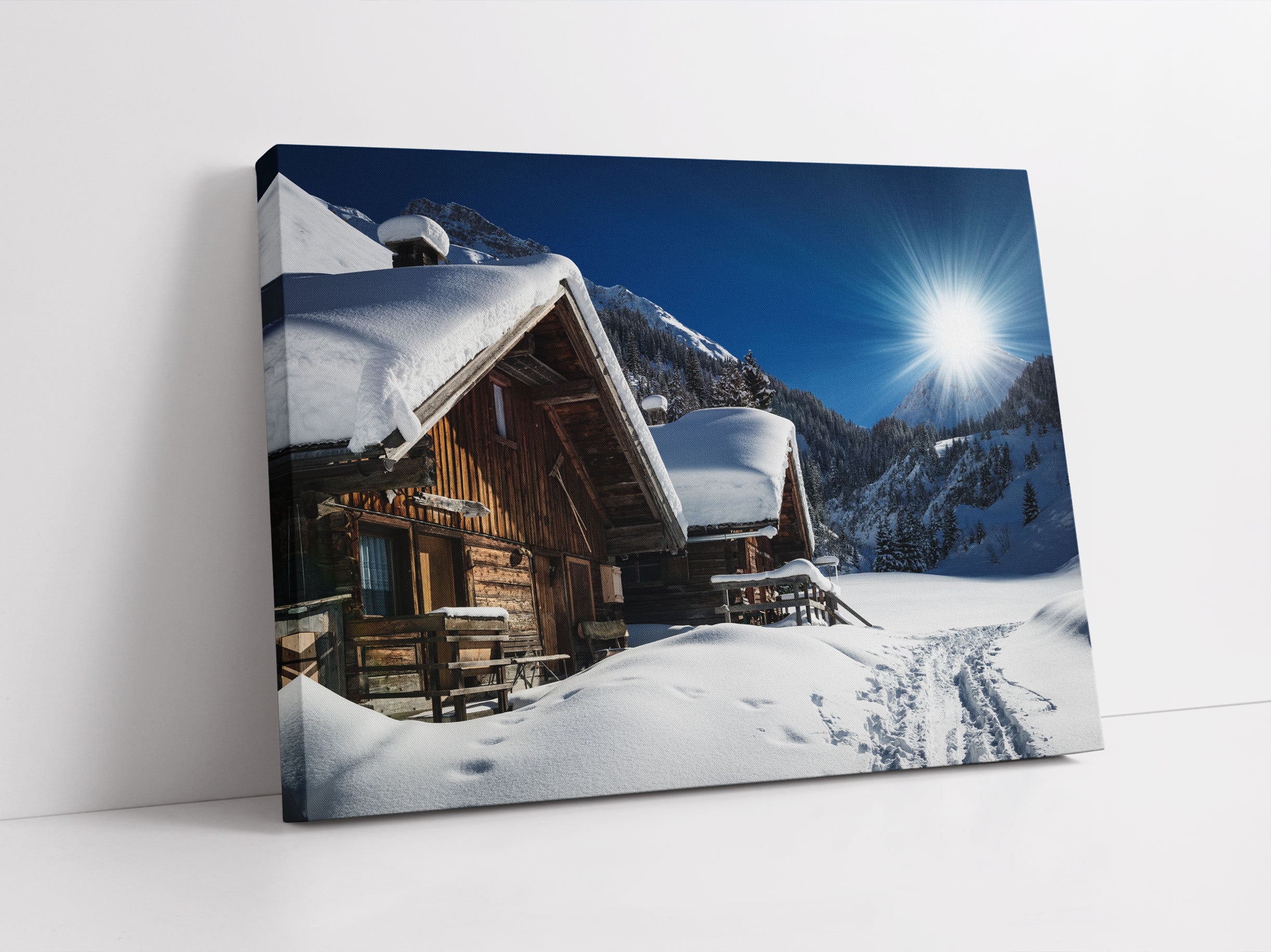 Verschneite Alpenhütte Leinwandbild Studio