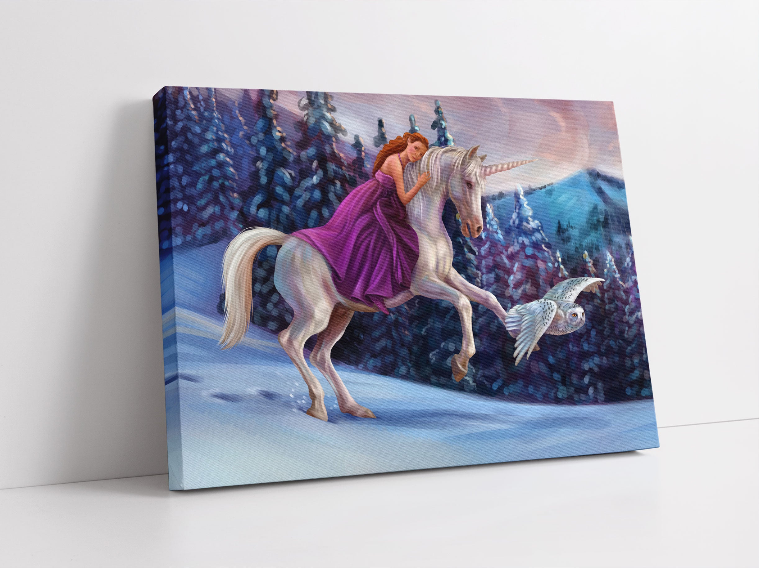 Mädchen reitet auf Einhorn im Winter Leinwandbild Studio