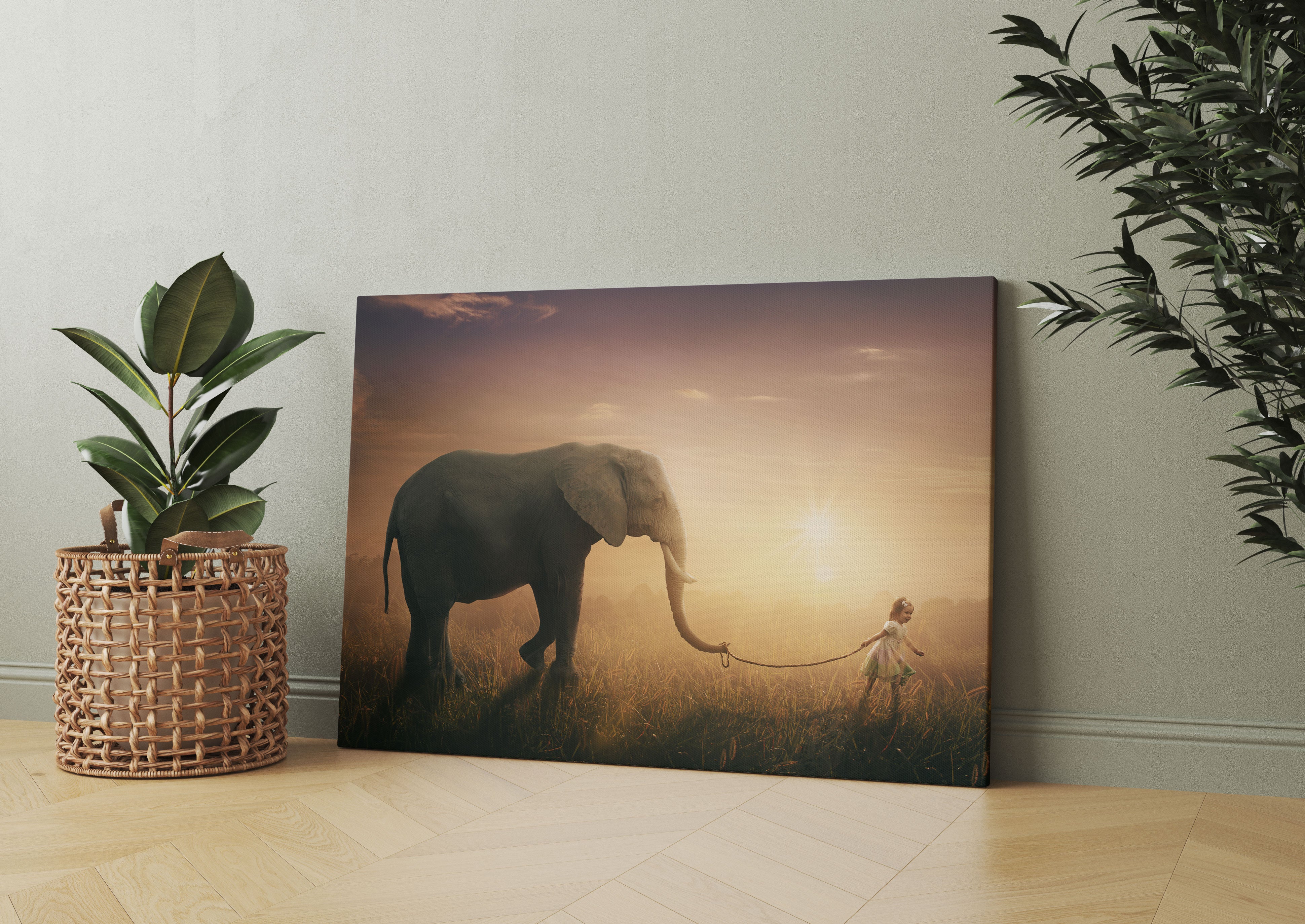 Kind und Elefant bei Sonnenuntergang Leinwandbild Wohnzimmer