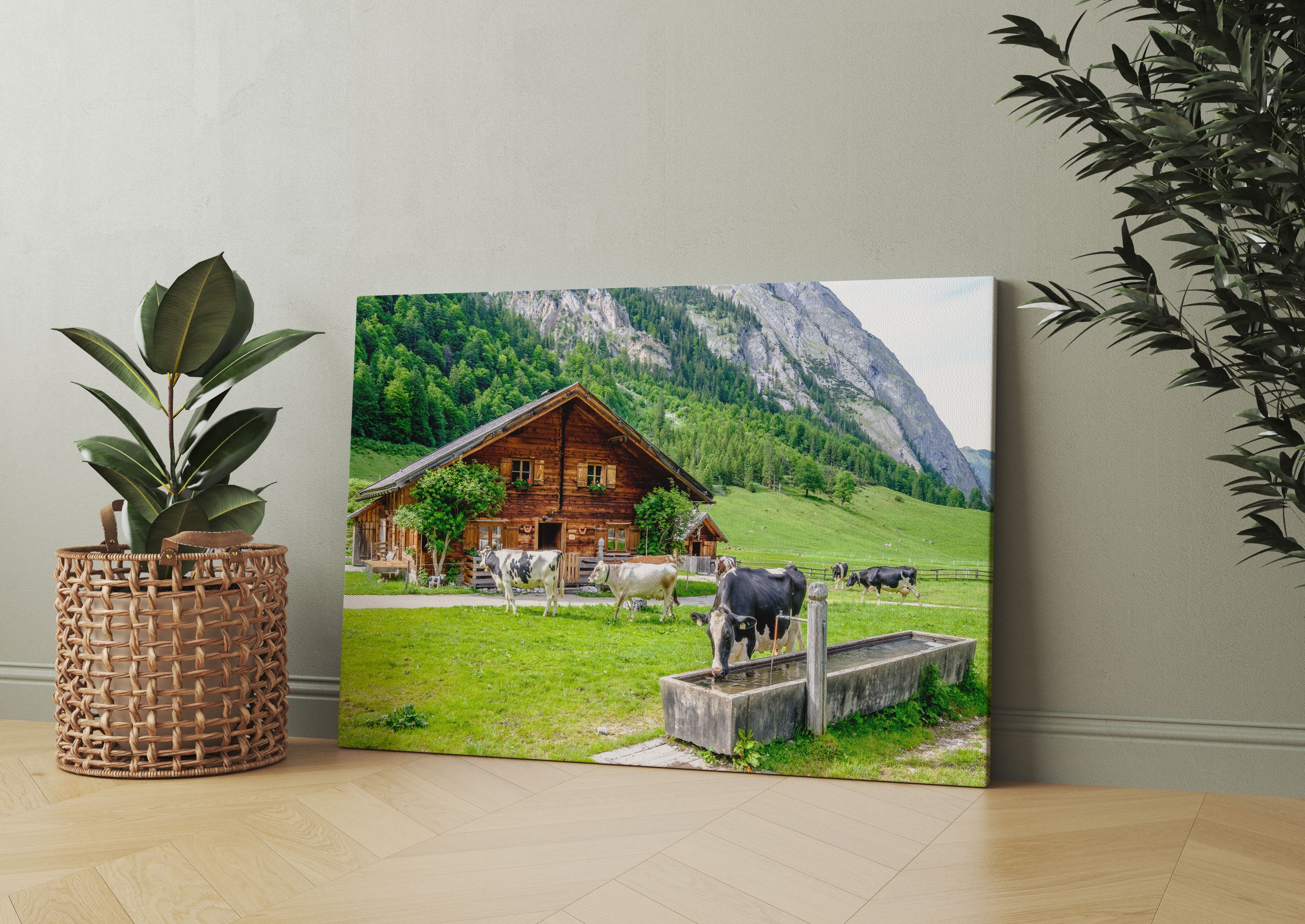 Kühe vor Blochhütte auf Albenweide Leinwandbild Wohnzimmer