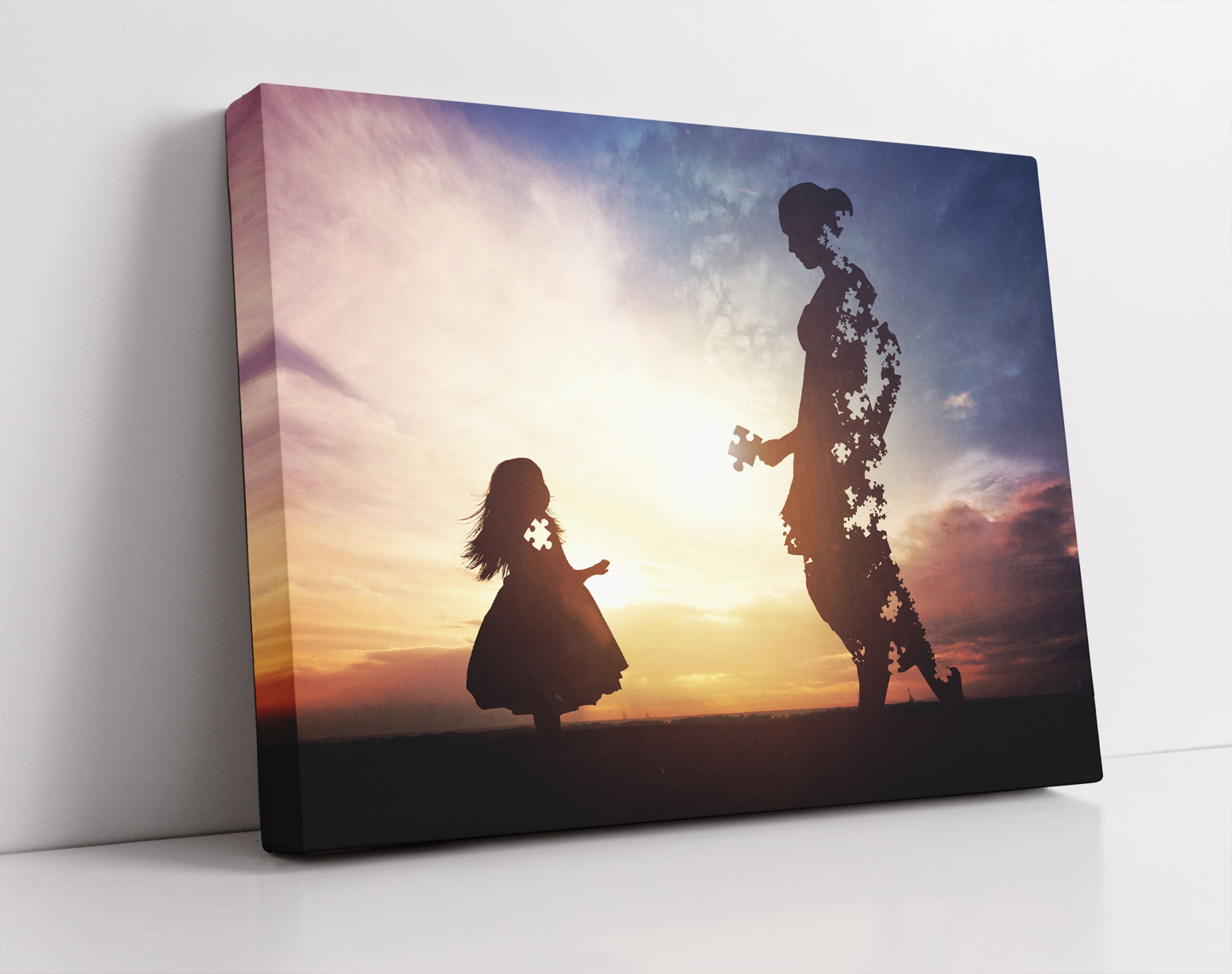 Silhouette Puzzle Mutter und Kind - Leinwandbild