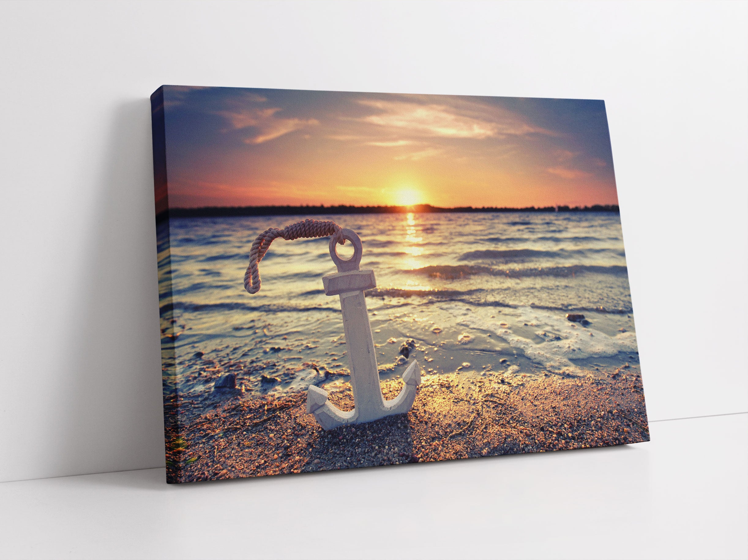 Anker am Ostseestrand im Sonnenuntergang Leinwandbild Studio