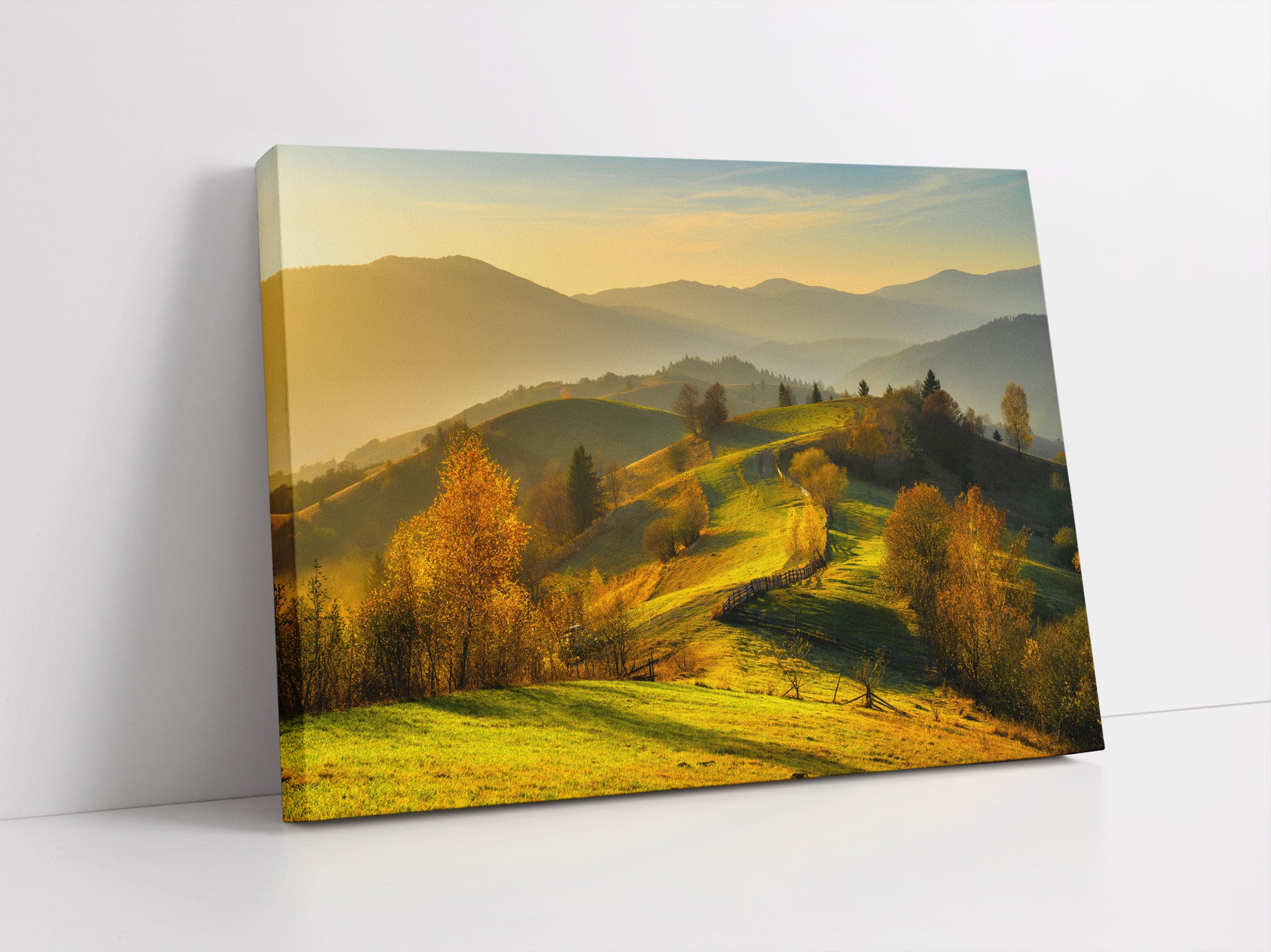 Hügelige Herbstlandschaft bei Sonnenuntergang Leinwandbild Studio